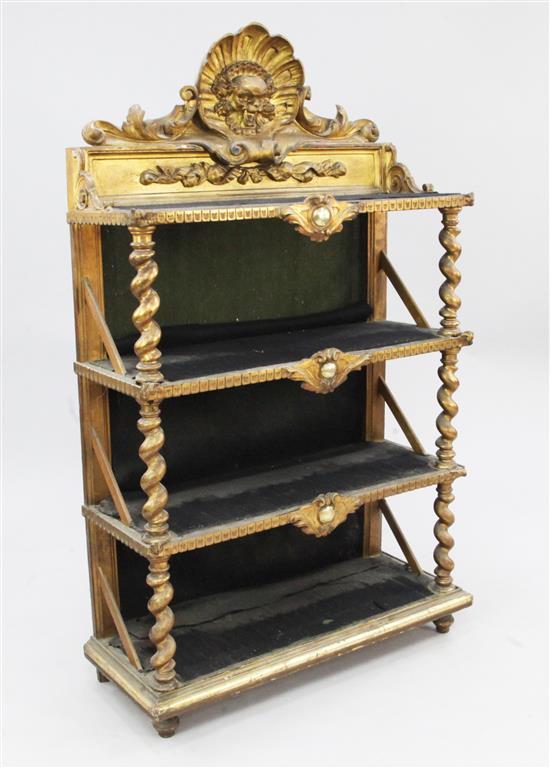 A Victorian carved giltwood open bookcase, W.2ft 8in.